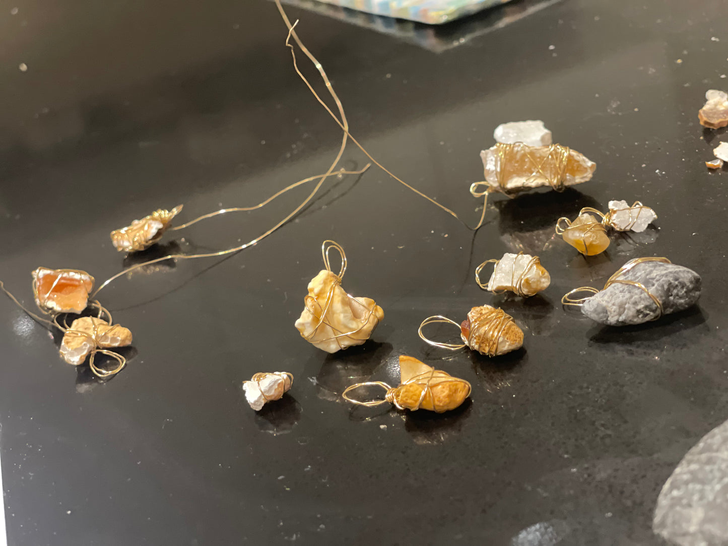 Rewiring service for Wise Rocks with gold, rose gold, and silver-coloured wire