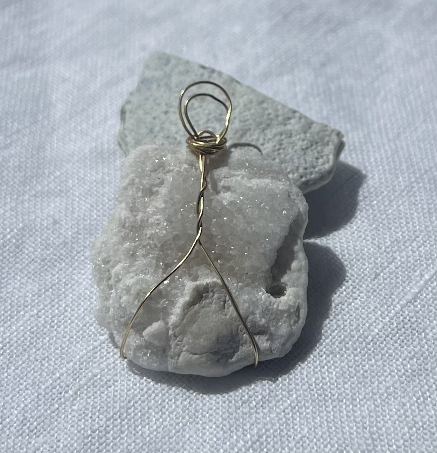 Sparkly pendant with tranquil design