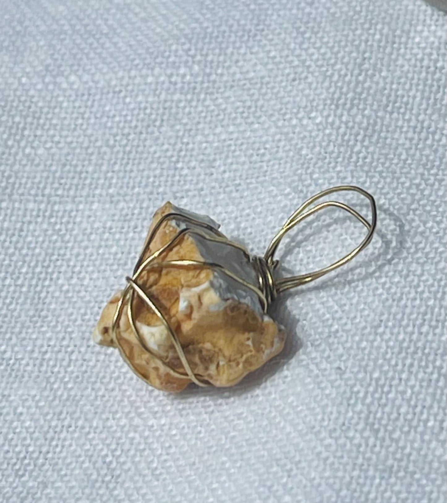 A small honey agate with golden tones