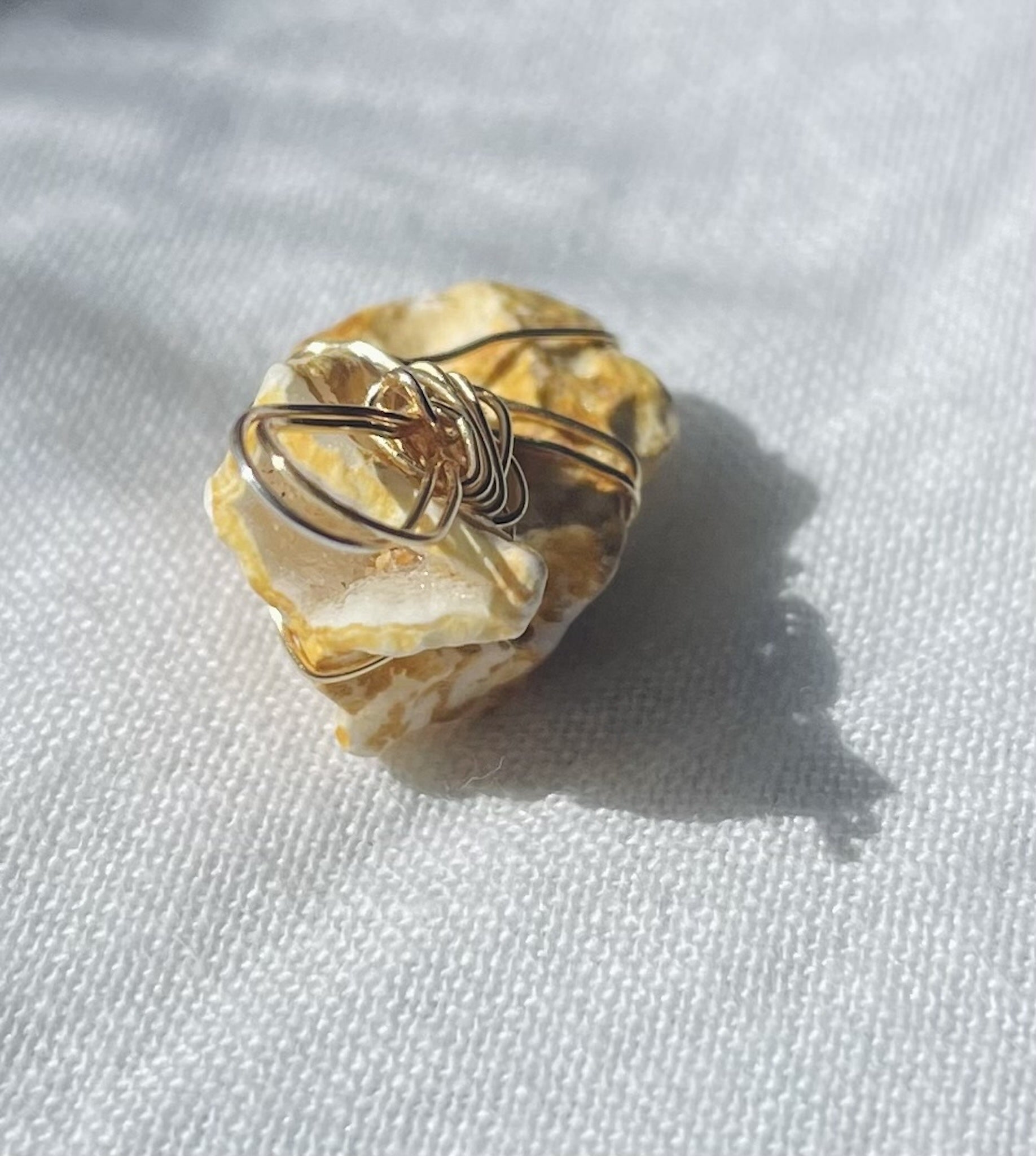 Golden geode with sparkling highlights and golden hues